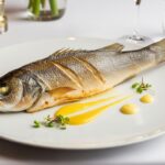 Elegant branzino dish on a fine dining menu.